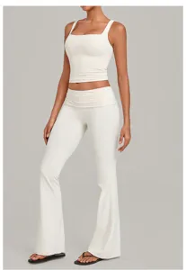 White two-piece yoga set featuring a square neck crop top and fold-over waist flare pants.