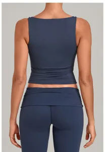 Einfarbiges doppellagiges nahtloses Yoga Tanktop und Hosen Set für Damen Fitness und Laufen.