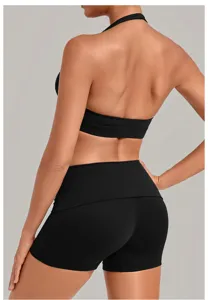 Close-up back view of black halter sports bra and high-waisted yoga shorts for women fitness.