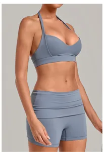 Halter neck sports yoga bra, deep V-neck activewear crop top for fitness running workouts.
