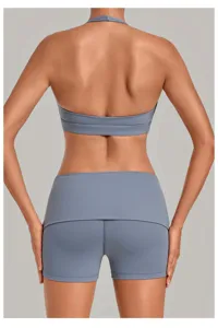 Detailed back view of the grey-blue halter activewear sports bra and high-waist fitness shorts.