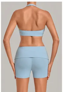Back view detail of light blue halter sports bra and yoga shorts for fitness and gym wear.