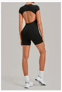Detail view of black backless yoga jumpsuit, tight fit and sleek design for fitness.