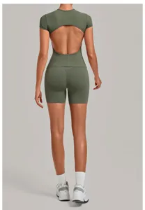Back detail of olive green open-back short sleeve yoga top and matching biker shorts set.