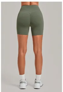 Pantaloncini da yoga a vita alta per donna, shorts sportivi fitness verdi con design push-up.