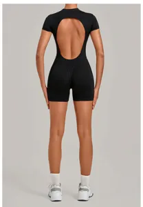 Detail view of a stylish black backless short sleeve yoga bodysuit with open back design.