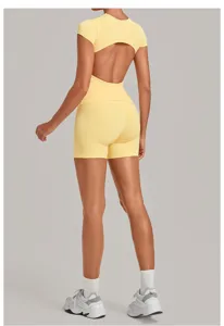 Detail view of yellow open back yoga activewear set showing back design and ruched details.