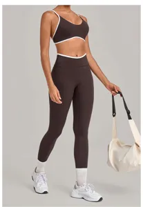 Detail view of the brown color-contrast piped sports bra and high-waist yoga leggings set.