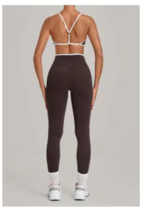 Colorblock edging yoga set with adjustable straps, high waist fitness leggings for gym running.