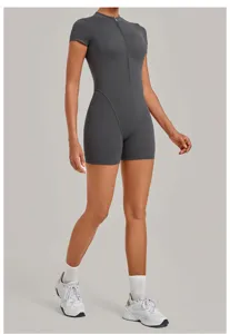 Detailed view of the dark grey zip-front short sleeve fitness romper, sleek workout apparel.