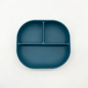 Silicone baby divided plate detail view, dark blue infant suction tableware for daily feeding.