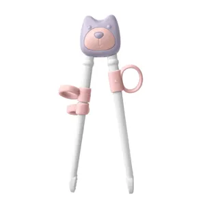 Kids training chopsticks with cute bear design and soft silicone helper rings for baby.