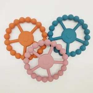 Juguete de mordedor para bebe de siliciona, bastoncillo relajante para la denticion.