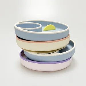 Silicone baby partitioned dinner plate with suction base, drop-resistant infant feeding dish.