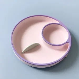 Silicone baby suction plate detail showing divided compartments and pink purple design for toddler meals