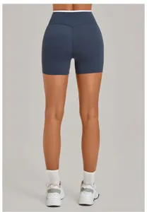 Back view of dark blue yoga shorts with contrast trim, naked feel quick dry fitness activewear.