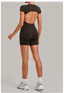 Back view detail of women's black open-back short sleeve tight yoga fitness activewear set.