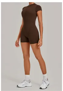 Brown short-sleeve zip yoga bodysuit for women, seamless activewear jumpsuit for fitness.