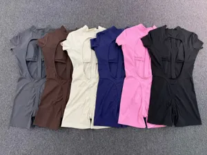 Backless short-sleeve yoga jumpsuit, fitness bodysuit with half zipper, stretchy workout activewear.