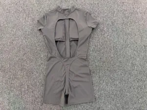 Gray short sleeve open back yoga romper bodysuit, fitness workout activewear details.