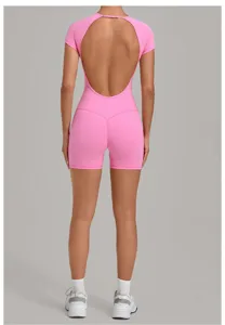 Combinaison de yoga rose dos nu pour femmes, short de sport fitness et entraînement.
