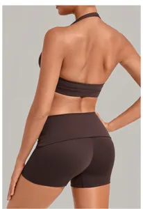 Back view detail of women brown halter yoga sports bra and high-waisted shorts set.