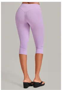 Detail view of the back side of light purple high-waisted cropped yoga leggings, seam design.