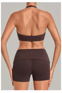 Brown halter backless sports bra and yoga shorts set, offering stylish back view and support.