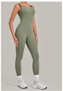 Green sleeveless yoga jumpsuit for women, comfortable fitted activewear for fitness and gym.