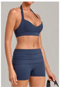 Deep V-neck halter sports bra and high-waist yoga shorts set for running fitness workout.