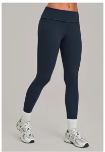 Donkerblauwe yogabroek met elastische omslagtaille voor dames, comfortabele sportleggings.