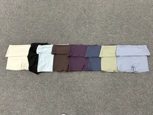Detail shot showing multiple colors of women fold-over waist quick-drying yoga shorts active wear