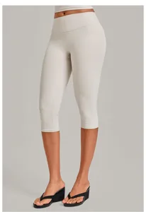 Light grey cropped yoga pants detail, high waist fitness leggings for running and workout.