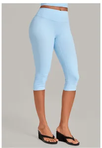 Light blue high waist yoga capris detailed view, stretchy fitness leggings for women workout.