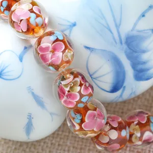 Handmade glass floral beads, translucent amber round loose beads for DIY jewelry making.