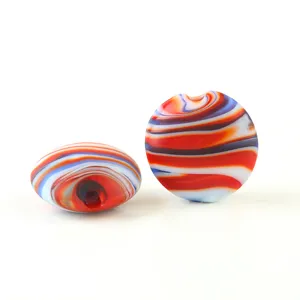 Detailed close-up of multi-color swirled frosted glass beads, flat round DIY jewelry findings