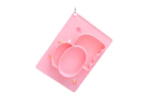 Detailed view of pink silicone baby divided plate, food-grade material for safe feeding.