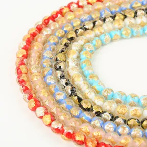 Colorful glass beads with gold foil inside, perfect for DIY jewelry making and crafts.