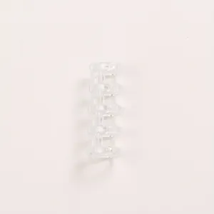 Detailed close-up of clear 5-hole loose leaf binder rings for DIY notebooks and planner setup.