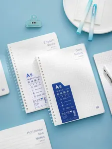 A5 soft PP silicone spiral notebook student notepad with grid lined paper for daily journaling.