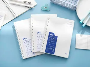 A5 minimalist soft spiral notebook with grid paper, student stationery school supplies.