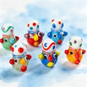 Handcrafted Phoenician human face glass beads for DIY charm bracelets and jewelry making.