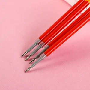 0.5mm red gel pen refills closeup, smooth writing bullet tip replacement for school student.