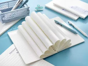 A5 grid spiral notebook with soft silicone coil, thick student stationery for daily writing.