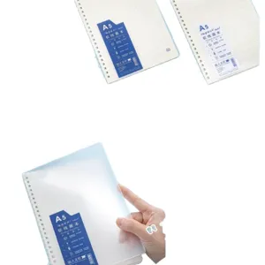 A5 spiral notebook with soft silicone PP cover and thick grid lined inner pages for students.