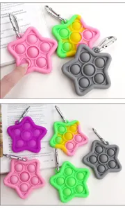 Silicone star pop bubble fidget toy keychain detail showing vibrant colors and metal clip.