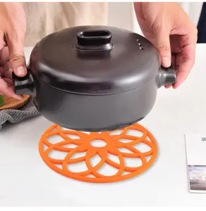 Silikon Hohl Hitzeisolierung Matte Detailansicht, flexible rutschfeste orange Tischmatte.