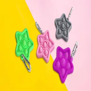 Star silicone pop it fidget toy keychain, mini bubble sensory stress relief toy for kids.