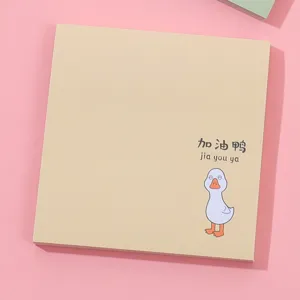 Vista detallada de notas adhesivas lindas con un diseño encantador de pato y texto.
