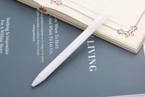 Close-up detail shot of white retractable gel pen, smooth writing student stationery tool.